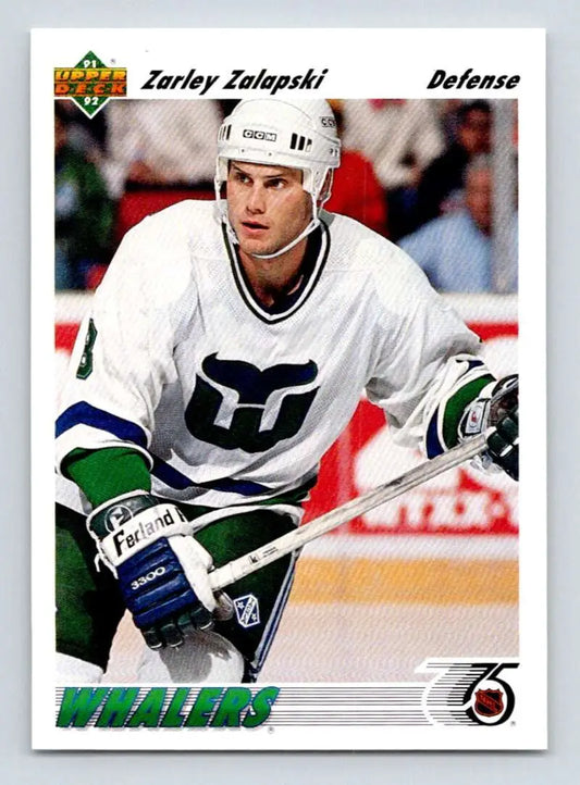 Hockey player in a white Hartford Whalers jersey holding a stick for Zarley Zalapski card