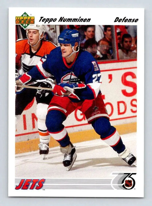 Hockey player in Winnipeg Jets uniform showcasing Teppo Numminen on the ice