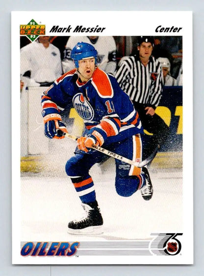 Hockey player in Edmonton Oilers jersey skating, featured on Mark Messier hockey card