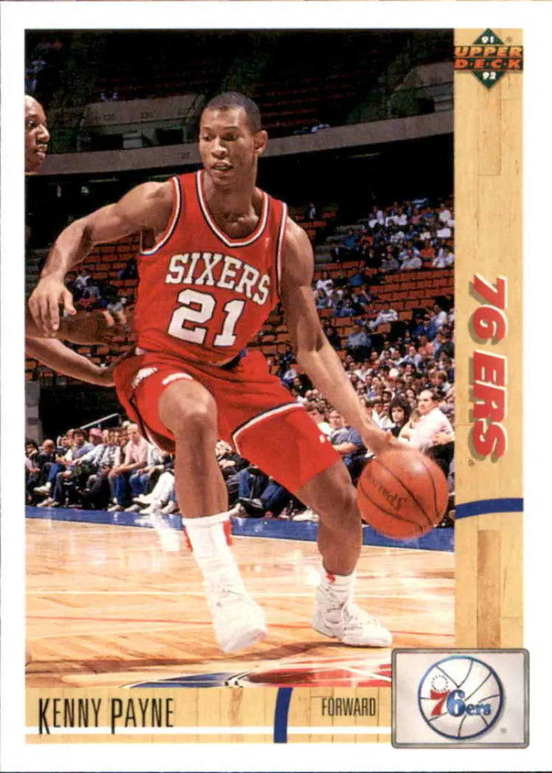 Kenny Payne dribbling in a red Philadelphia 76ers jersey for Upper Deck card design