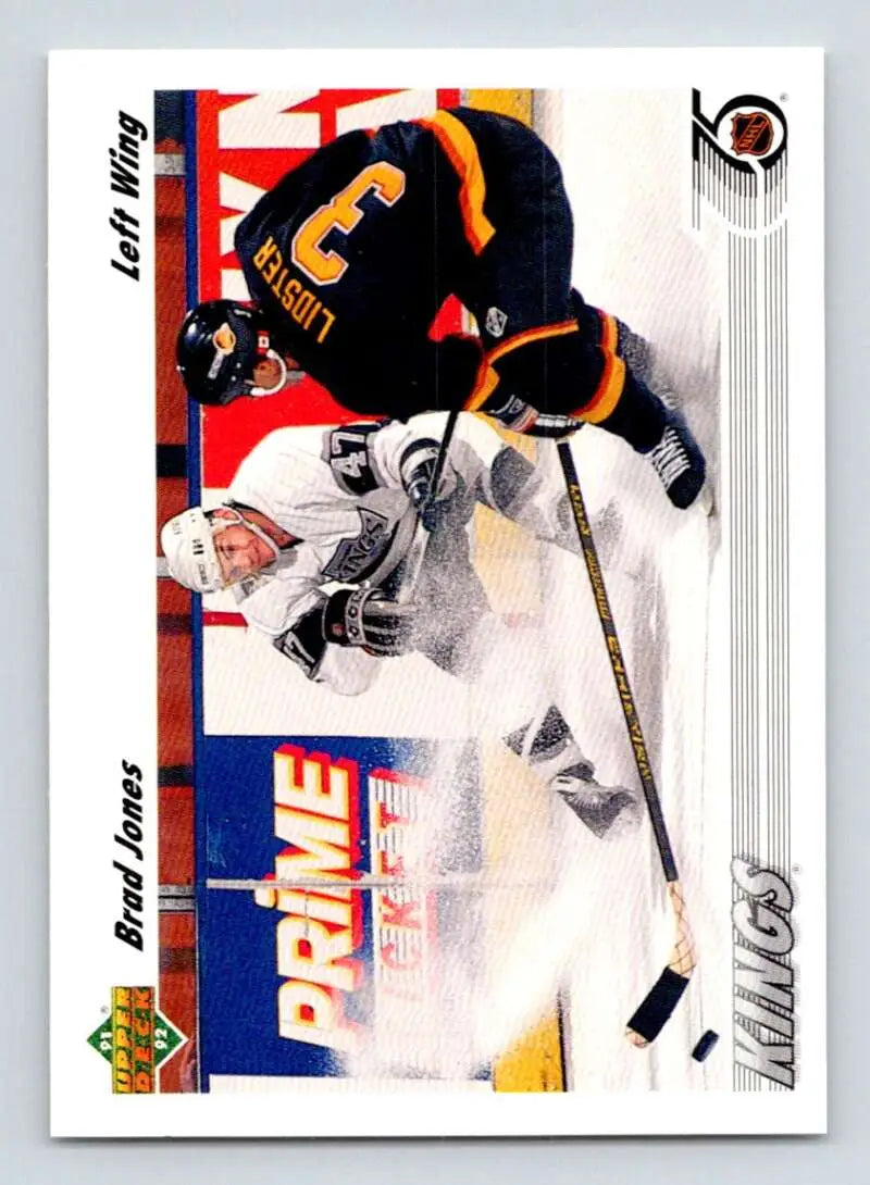Hockey card of Brad Jones colliding with a player in a black and white uniform
