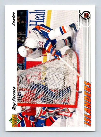 Hockey trading card of Ray Ferraro crashing into a goalie for New York Islanders Upper Deck