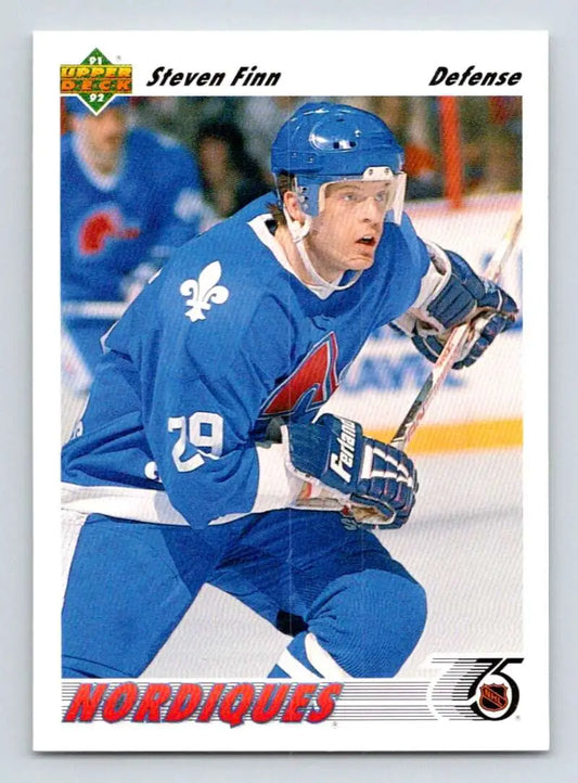 Hockey player in blue Quebec Nordiques jersey number 29 on Steven Finn hockey card