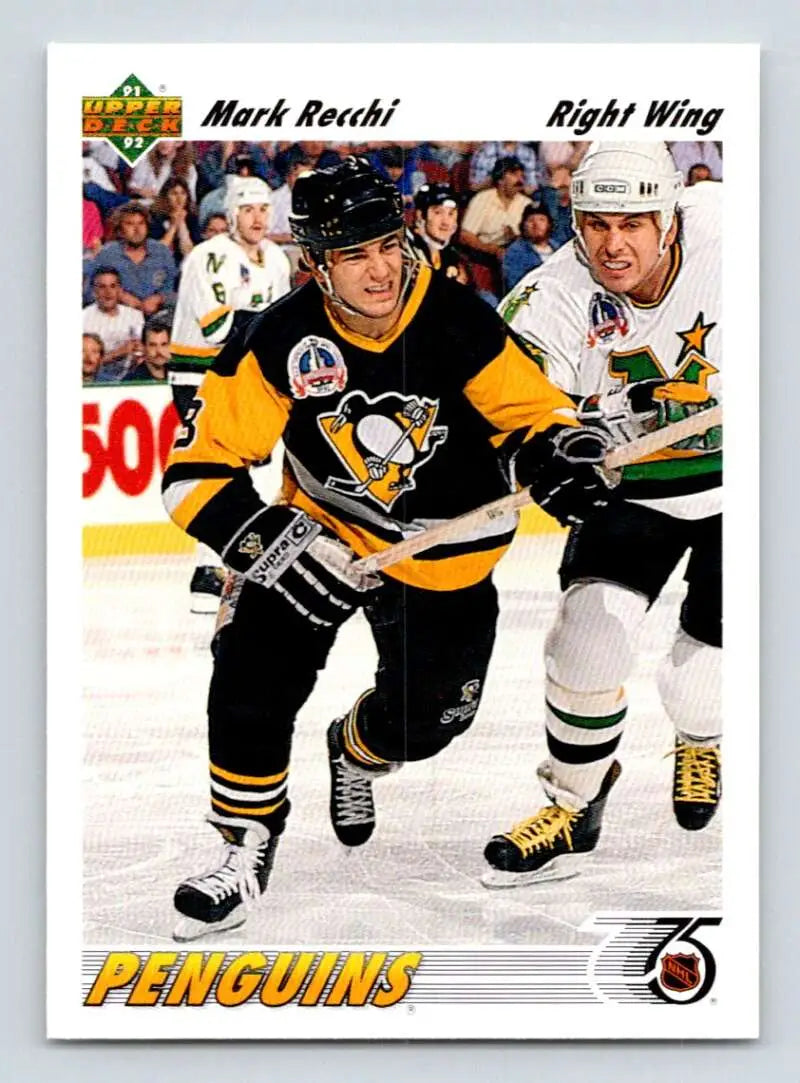 Mark Recchi skating in black and gold uniform, 1991-92 Upper Deck #346 Hockey Card