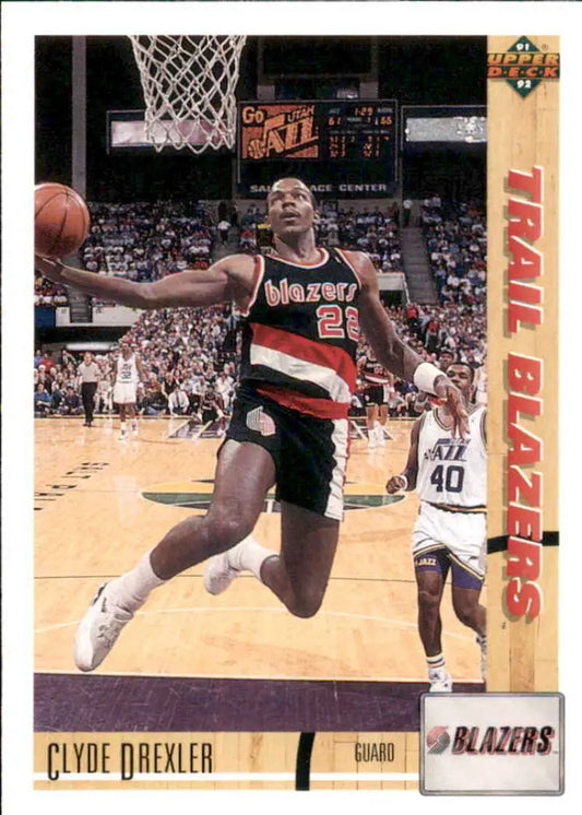 Basketball card of Clyde Drexler soaring towards the basket for the Portland Trail Blazers
