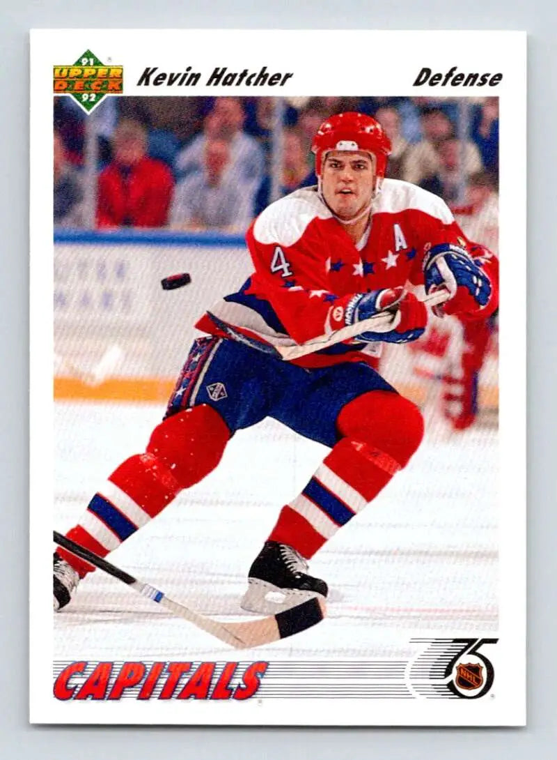 Kevin Hatcher skating in red Washington Capitals jersey featured on Upper Deck hockey card