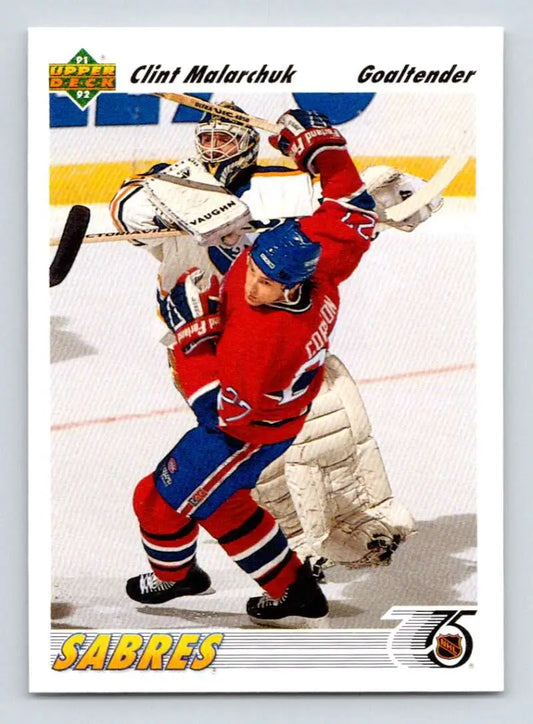 Hockey card of Clint Malarchuk and Buffalo Sabres in action during a game