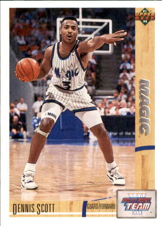 Dennis Scott dribbling in Orlando Magic uniform on 1991-92 basketball card image