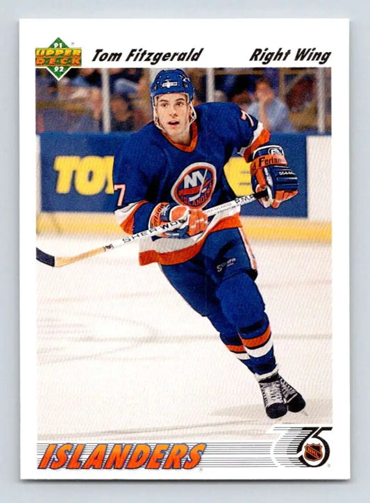 Hockey player in New York Islanders jersey showcasing Tom Fitzgerald on ice