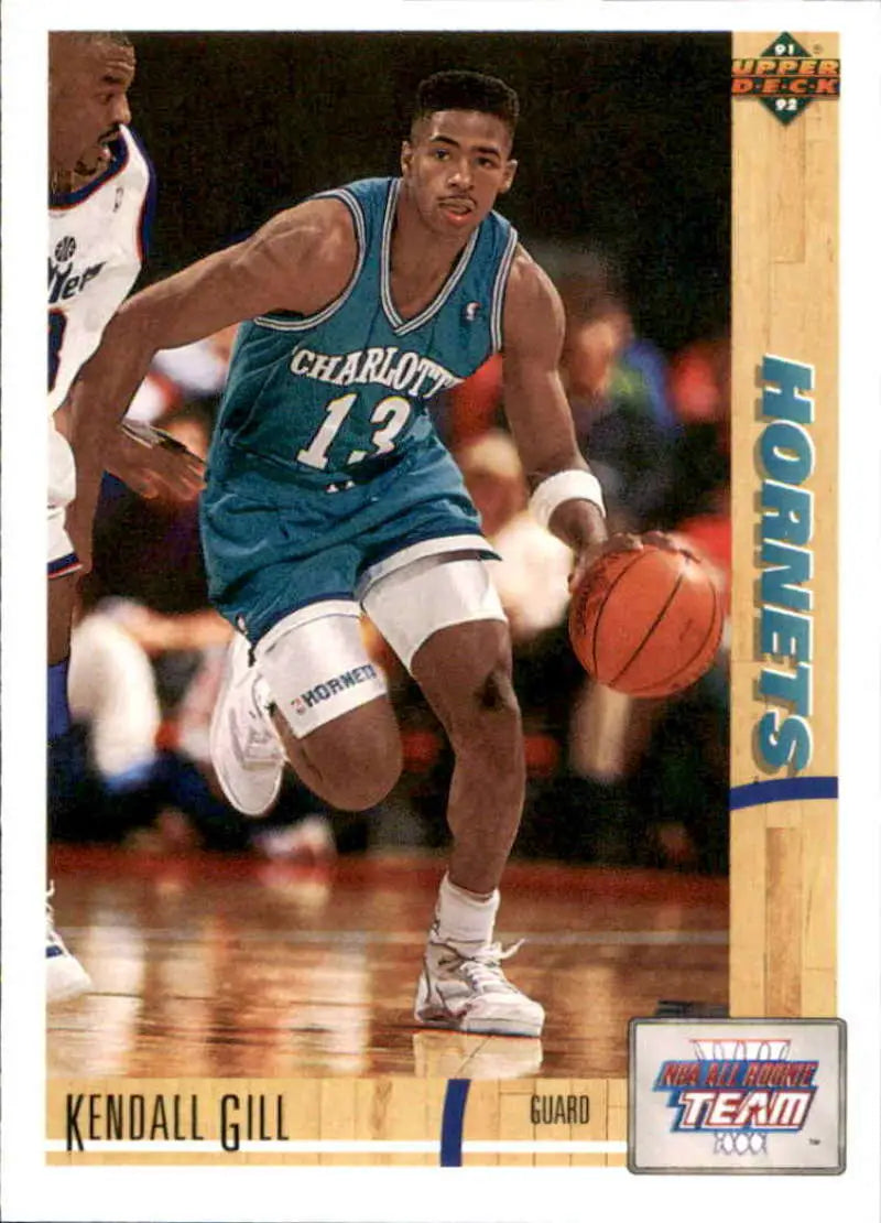 Kendall Gill dribbling in teal uniform on Charlotte Hornets basketball card
