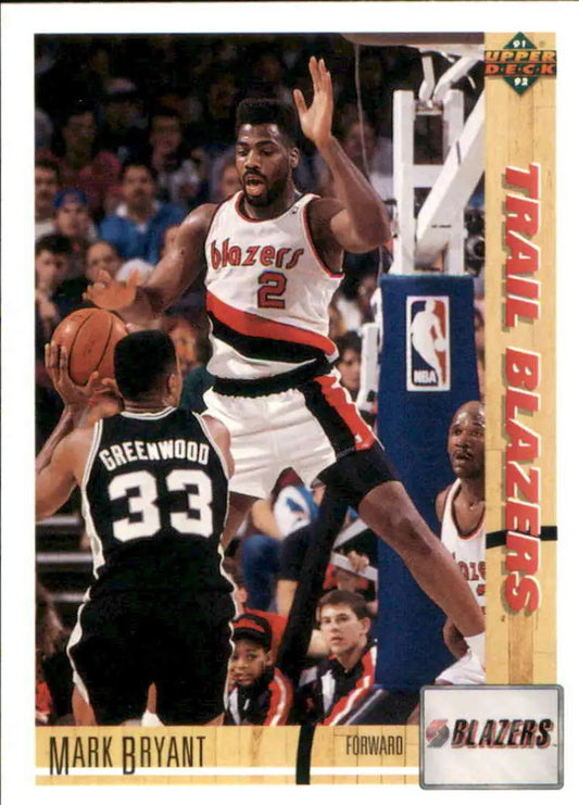 Basketball trading card of Mark Bryant leaping for the Trail Blazers against Spurs