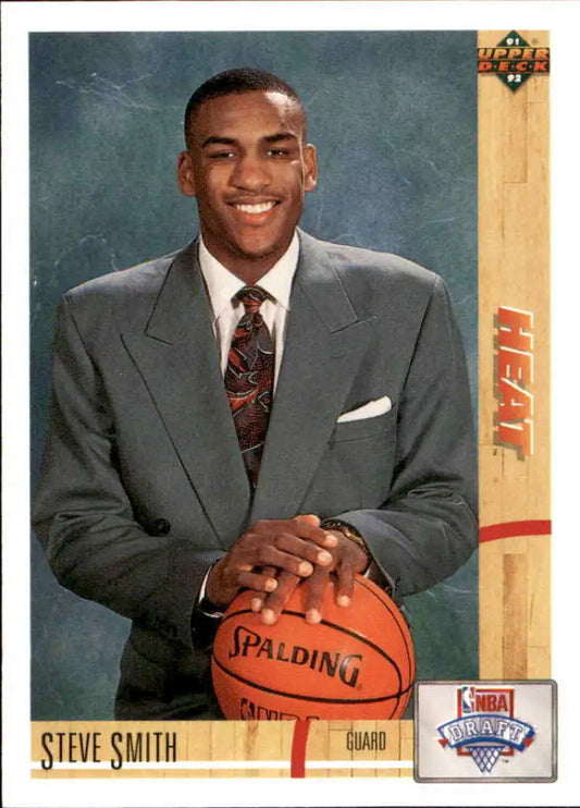 Steve Smith Miami Heat basketball card in a gray suit holding a Spalding basketball
