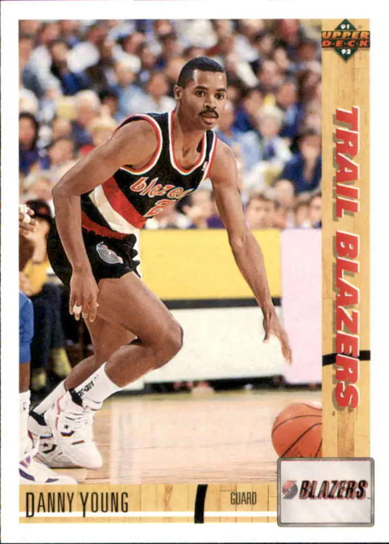 Basketball trading card of Danny Young dribbling in a black Portland Trail Blazers uniform