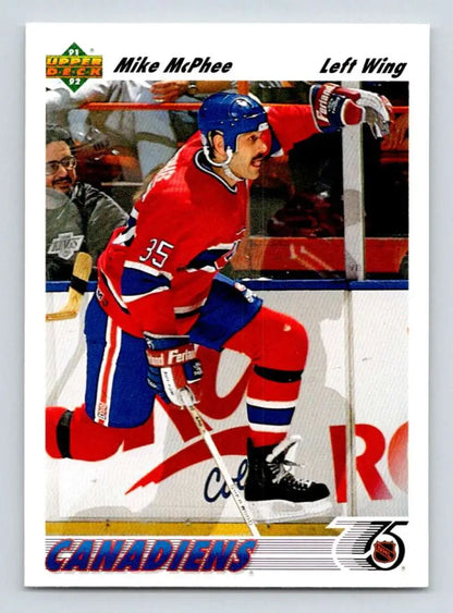 Hockey player in Montreal Canadiens uniform skating, featuring Mike McPhee card