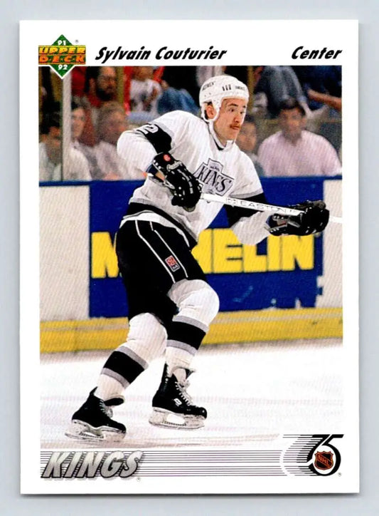 Hockey player in white Los Angeles Kings jersey for Sylvain Couturier Upper Deck card