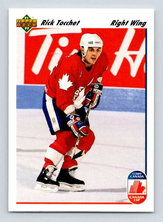 Hockey player in red Team Canada jersey skating, showcasing Rick Tocchet Upper Deck card