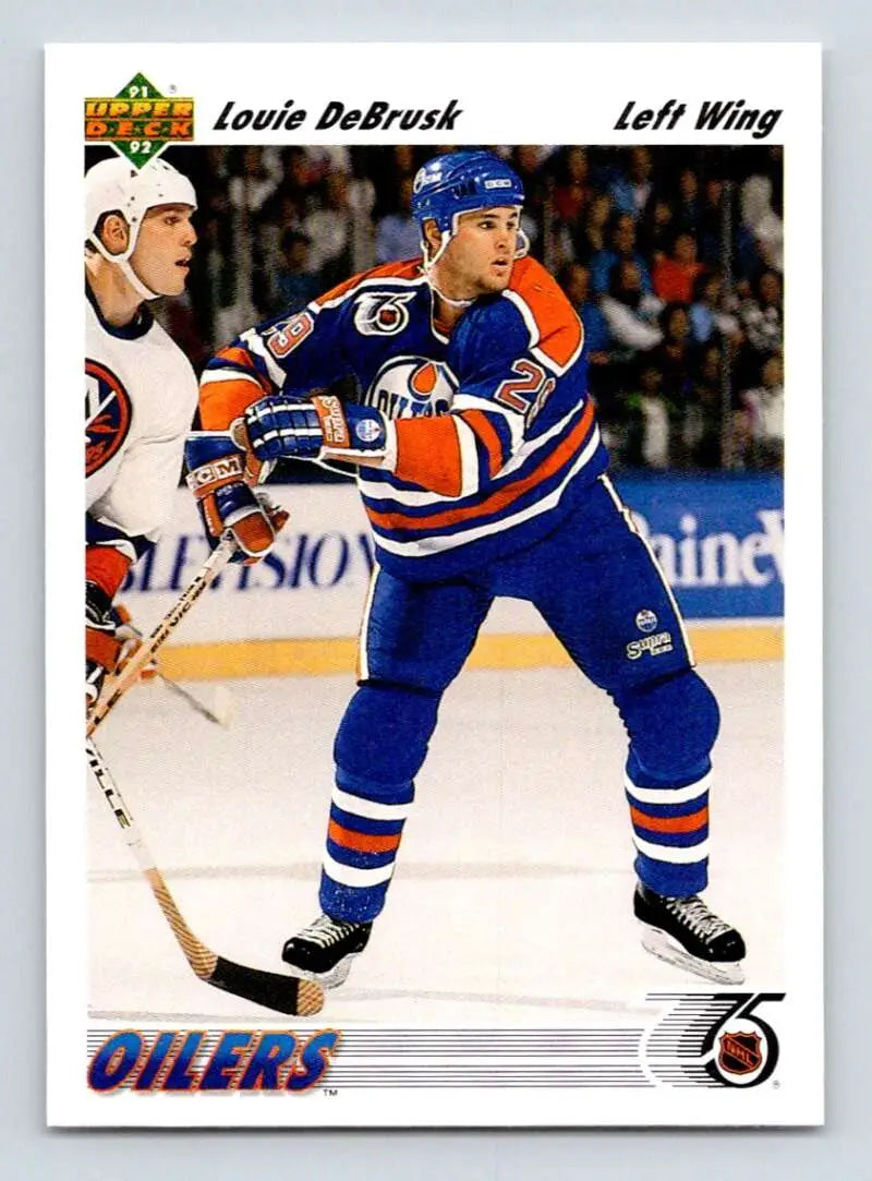 Louie DeBrusk in action wearing Edmonton Oilers jersey on ice hockey card