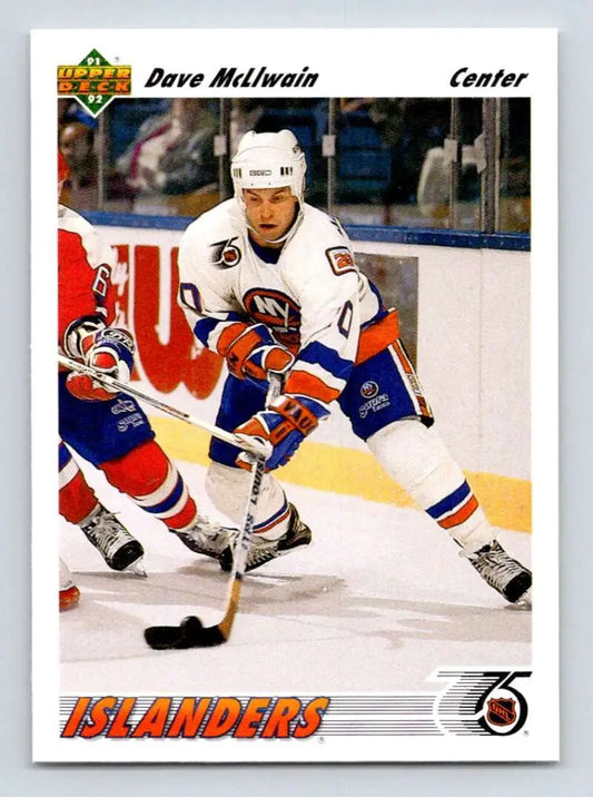 Hockey player in white New York Islanders jersey controlling puck, Dave McLlwain card