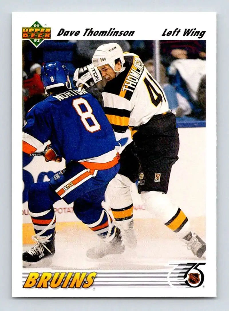 Hockey card featuring Boston Bruins and Rangers players in fierce gameplay action