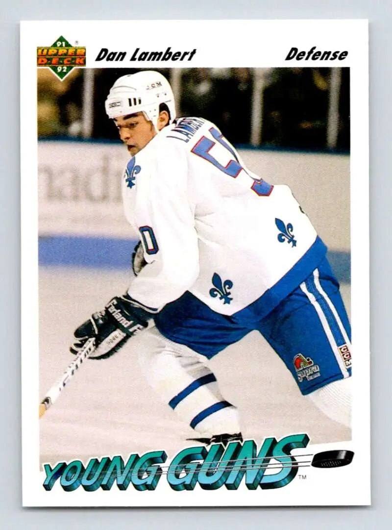Hockey player in Quebec Nordiques uniform skating, featured on Dan Lambert rookie card