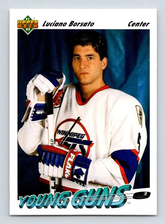 Luciano Borsato posing in a white Winnipeg Jets jersey for a hockey card photo