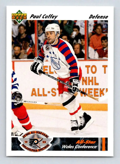 Hockey player in white jersey with red and blue stripes representing Paul Coffey, Pittsburgh Penguins