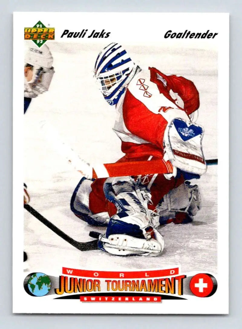 Hockey card featuring Pauli Jaks making a save in red and blue uniform