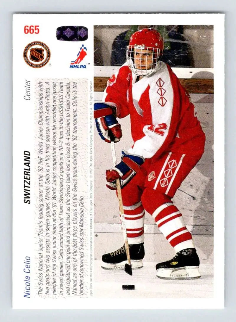 Nicola Celio in red and white uniform on ice skates for Upper Deck rookie card