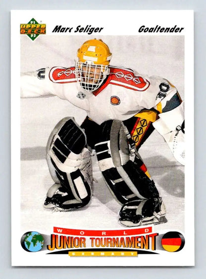 Hockey goalie in white and orange uniform, featured on Marc Seliger Upper Deck rookie card