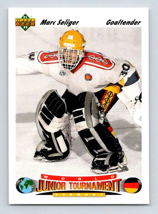 Hockey goalie in white and orange uniform, featured on Marc Seliger Upper Deck rookie card