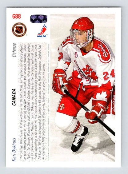 Hockey player in red and white Team Canada jersey number 24 on Karl Dykhuis hockey card