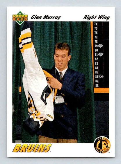 Hockey player in dark suit showcasing Glen Murray Boston Bruins jersey for Upper Deck card