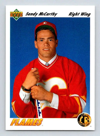 Sandy McCarthy poses in a red Calgary Flames jersey for the Upper Deck hockey card