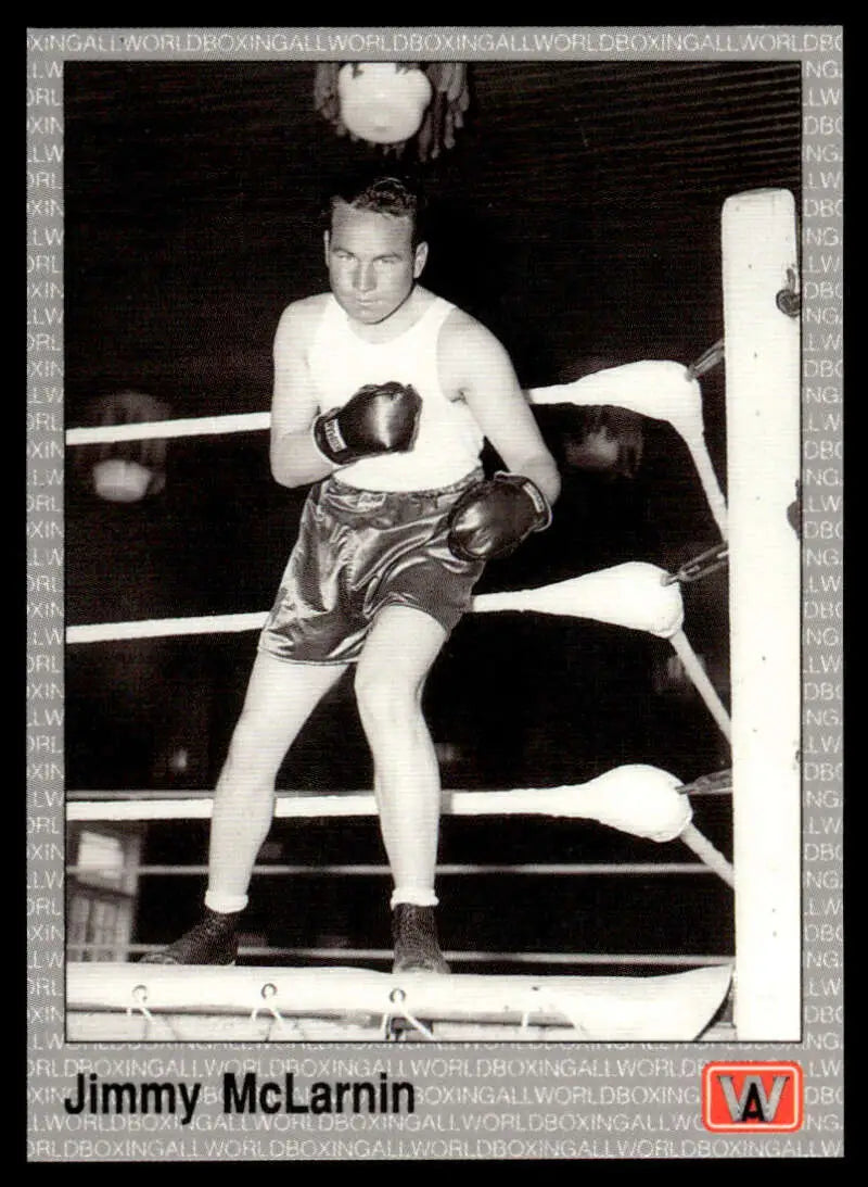 Boxer in stance wearing gloves showcasing Jimmy McLarnin Boxing Card in boxing history