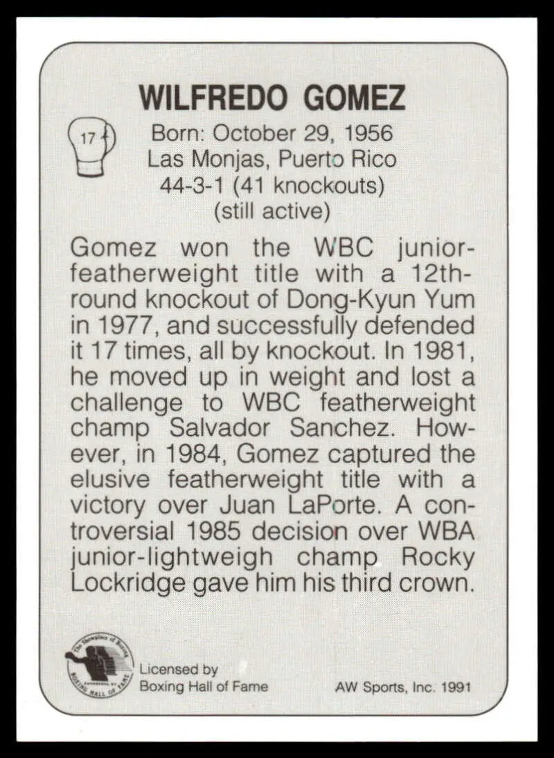 Black and white boxing card featuring Wilfredo Gomez NM-MT with career highlights