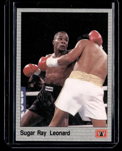 Vintage boxing trading card featuring Sugar Ray Leonard in action during a match