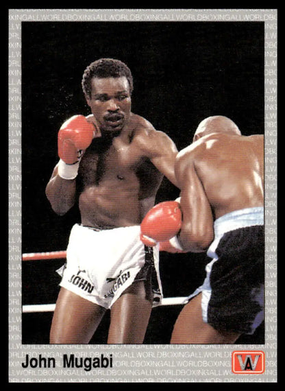 Two boxers in a match; featured in a John Mugabi NM-MT boxing card