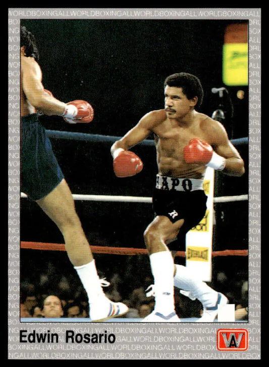 Edwin Rosario in black shorts and red gloves, featured in Edwin Rosario NM-MT boxing card