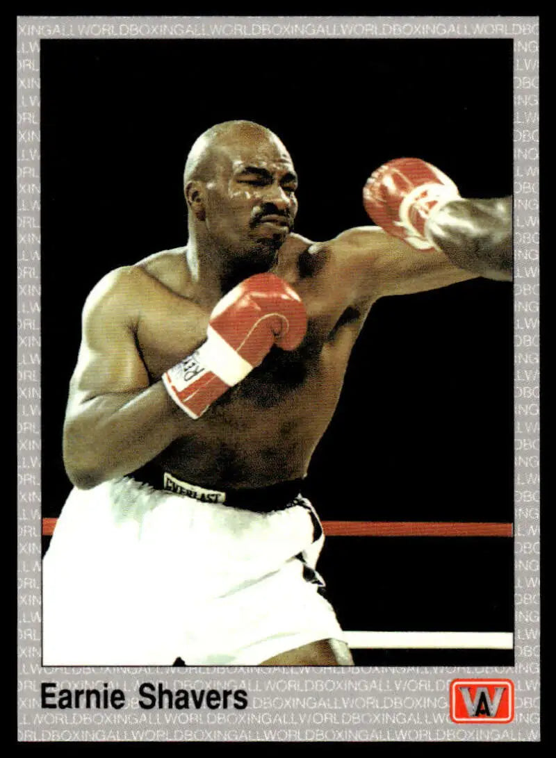 Earnie Shavers in white shorts and red gloves during a fight for boxing card collectors