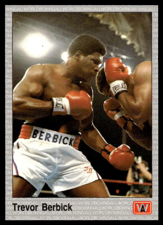 Two boxers in red gloves, one in white shorts labeled Berbick, for Trevor Berbick NM-MT Boxing Card