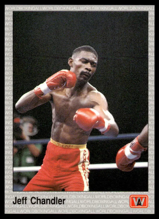 Boxer in red shorts throwing a punch, featured on Jeff Chandler NM-MT Boxing Card