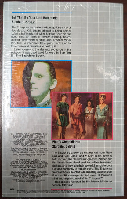 Magazine page with album reviews and artist images from Star Trek Columbia House VHS