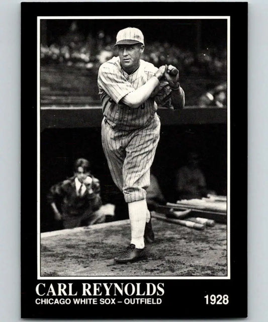 Black and white photo of Chicago White Sox player Carl Reynolds in batting stance