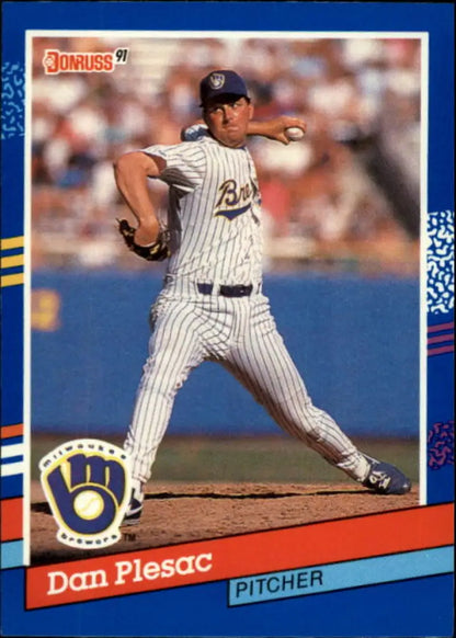 Baseball card of Dan Plesac in pinstriped uniform for Milwaukee Brewers