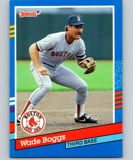 1991 Donruss Wade Boggs baseball card showcasing Boston Red Sox third baseman in action