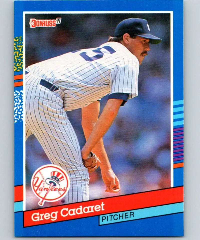 Greg Cadaret New York Yankees Baseball Card mid-delivery in pinstripe uniform