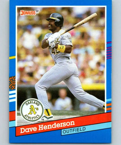 1991 Donruss baseball card featuring Dave Henderson of the Oakland Athletics mid-swing