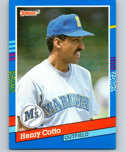 1991 Donruss Henry Cotto Seattle Mariners Baseball Card in white uniform and blue cap