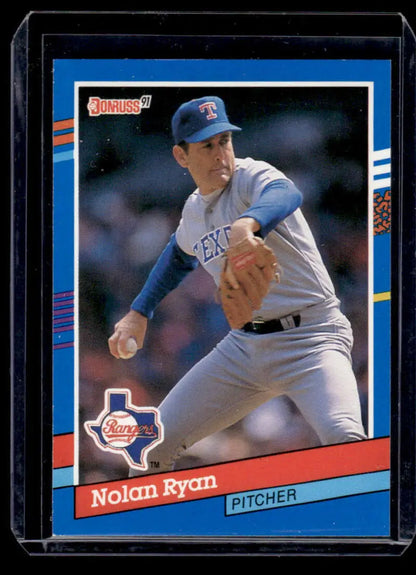 1991 Donruss baseball card of Nolan Ryan pitching for the Texas Rangers in mid-delivery