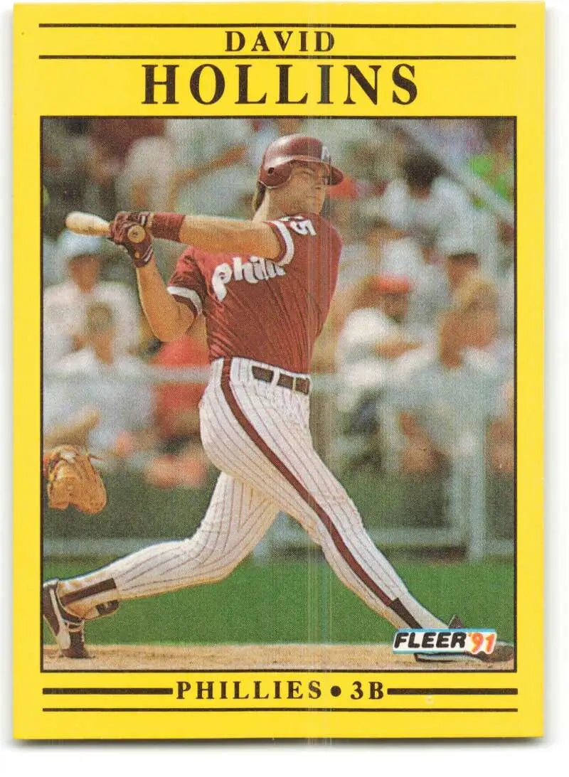 Yellow-bordered baseball card of Dave Hollins in batting stance for Philadelphia Phillies